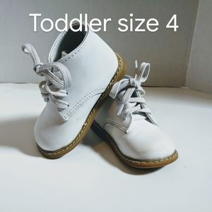 White hard bottom walking shoes. Great condition